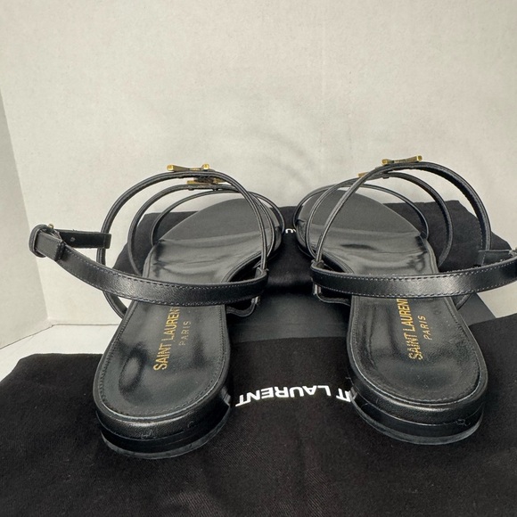 CASSANDRA LEATHER WITH GOLD EMBLEM HARDWARE IN BLACK SANDALS. - Picture 7 of 11